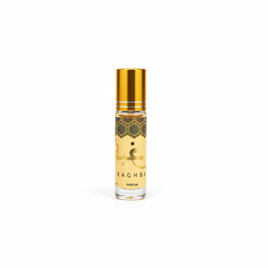 Perfume oriental Raghba 6ml aceite concentrado con vainilla y oud, frasco dorado con caligrafía árabe