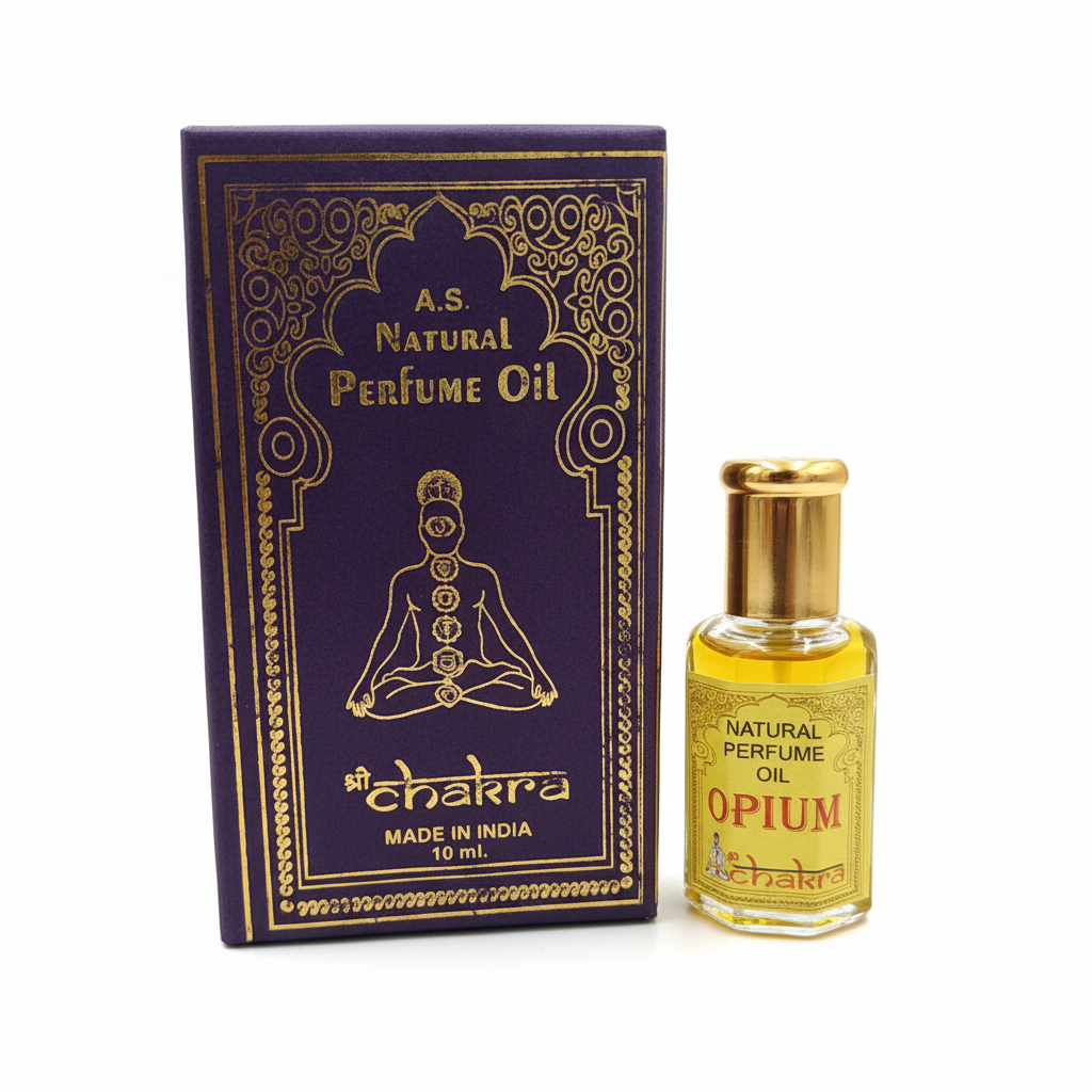 Frasco de Aceite de Perfume Chakra Opium con caja sobre fondo blanco limpio - Detalle de fragancia especiada oriental natural