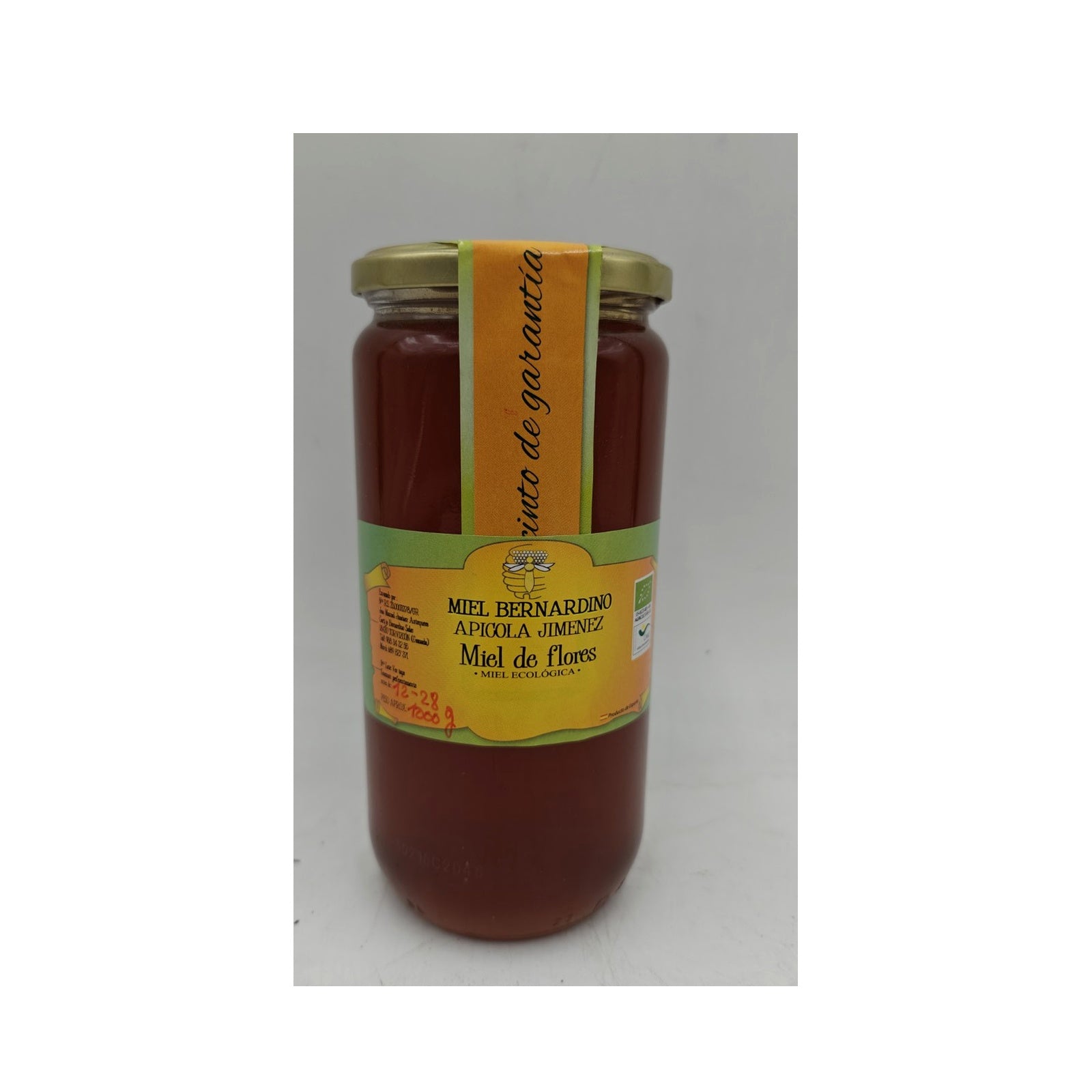 Miel ecológica de mil flores de la Alpujarra 1 kg sobre fondo blanco